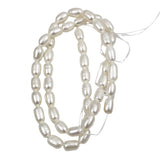 White Freshwater 8mm Oval Pearls Strand