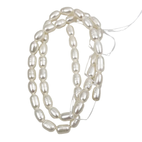 White Freshwater 8mm Oval Pearls Strand