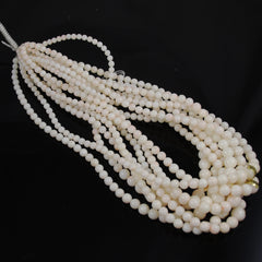 Angel Skin Coral Graduated Bead Strands - Genuine natural undyed vintage